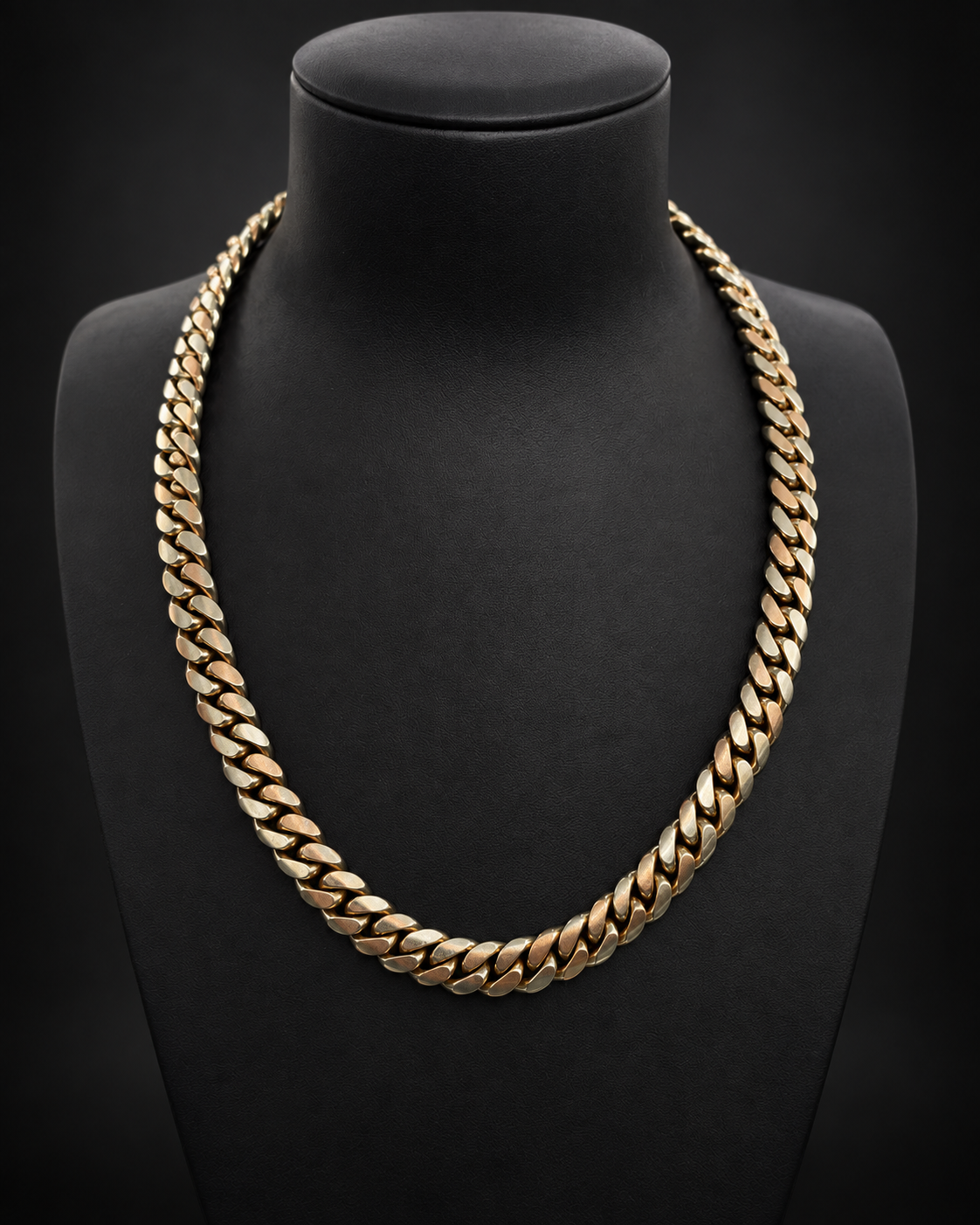 182.1 gram 10KT rose & white gold Miami Cuban chain, reference 100015, displayed on a black bust.