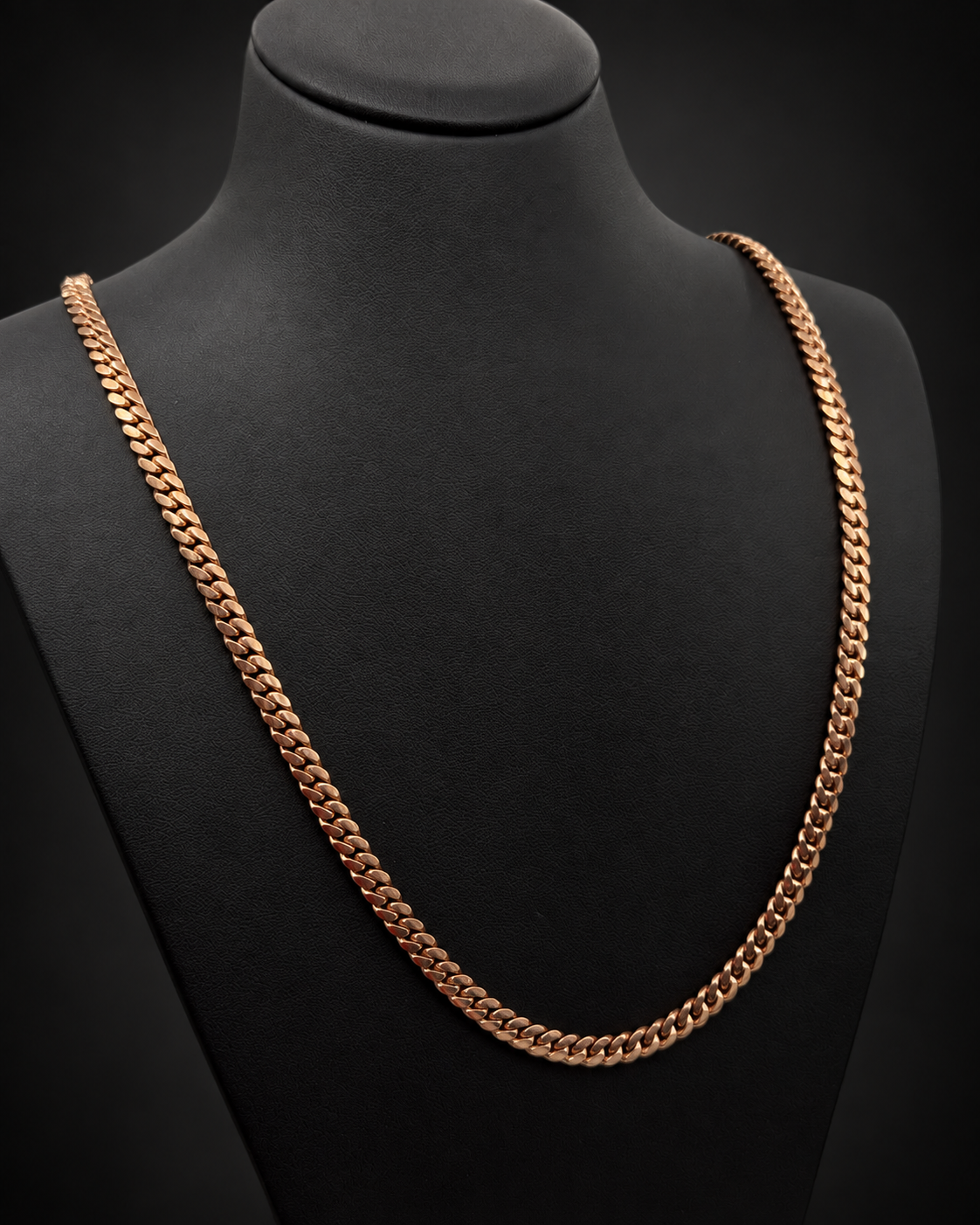 Reference 101580, chain 1: 48.8g 10KT rose gold Miami Cuban chain, 24 inches long, 5.3mm wide, displayed on a black bust.
