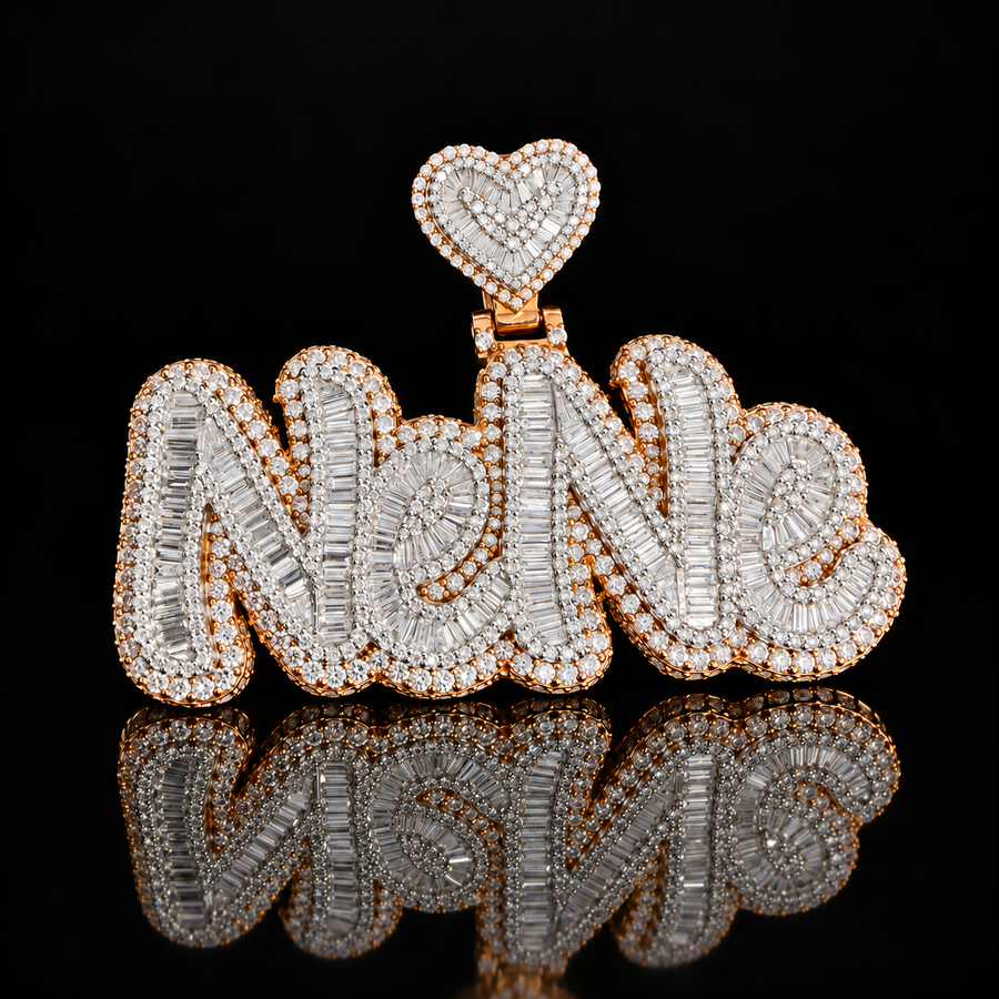 NeNe baguette diamond nameplate with heart bail